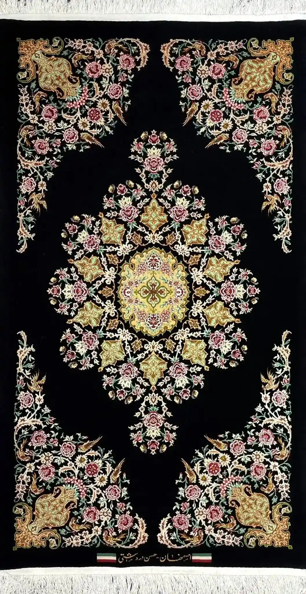 "Beautiful Persian rug with intricate floral motifs on a black background."